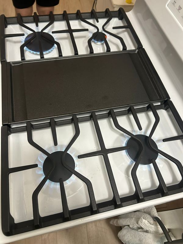 Gas range connected and leak-tested