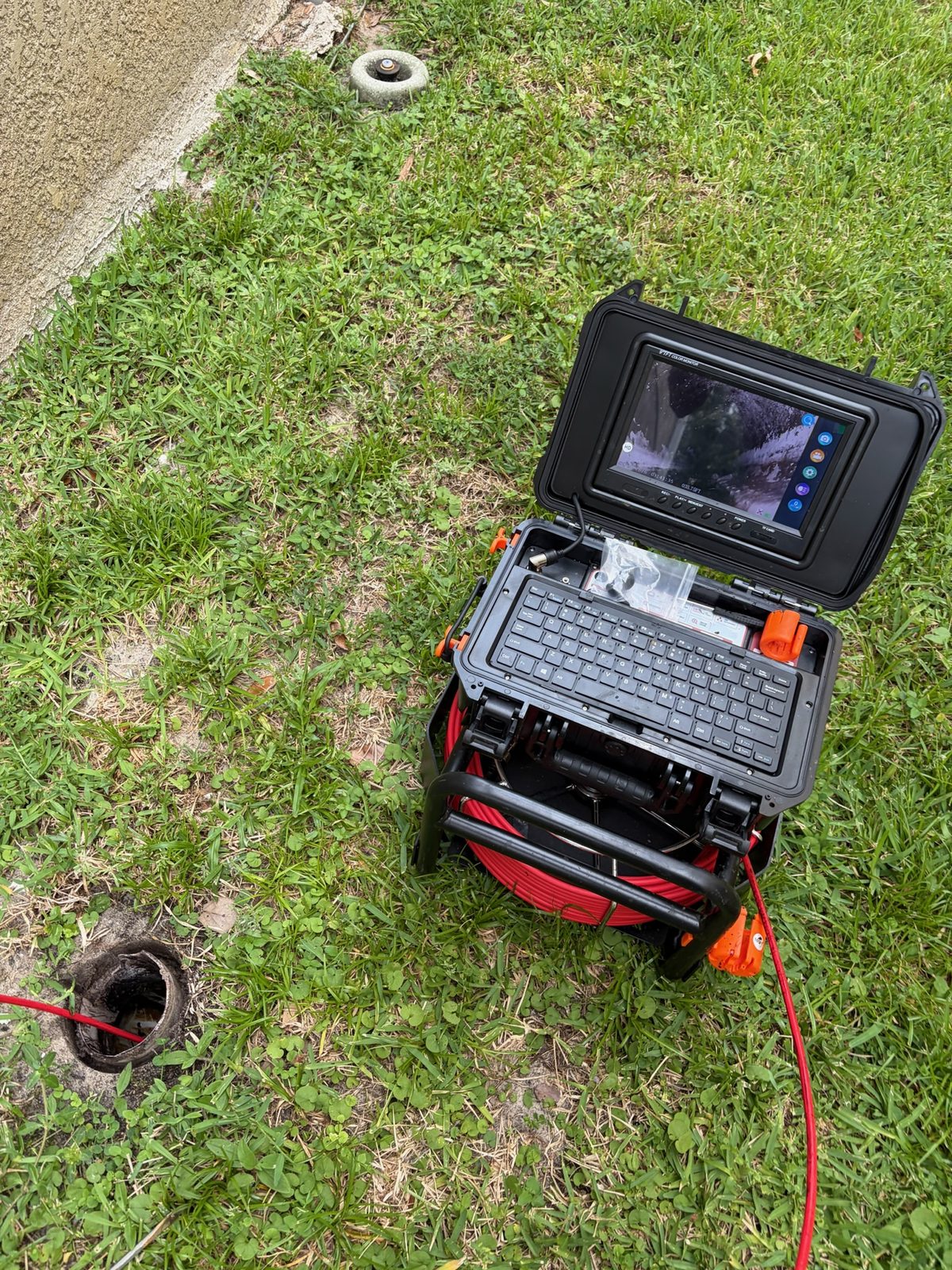 Camera down the main line at the cleanout, recorded so you see what we see