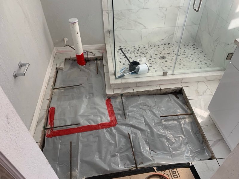 Bathroom drain relocated under the slab, prepped for concrete