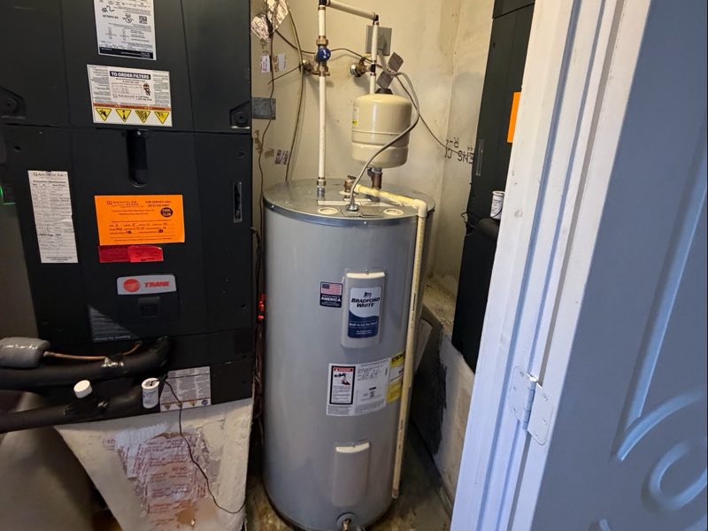 Water heater replaced in a tight utility closet